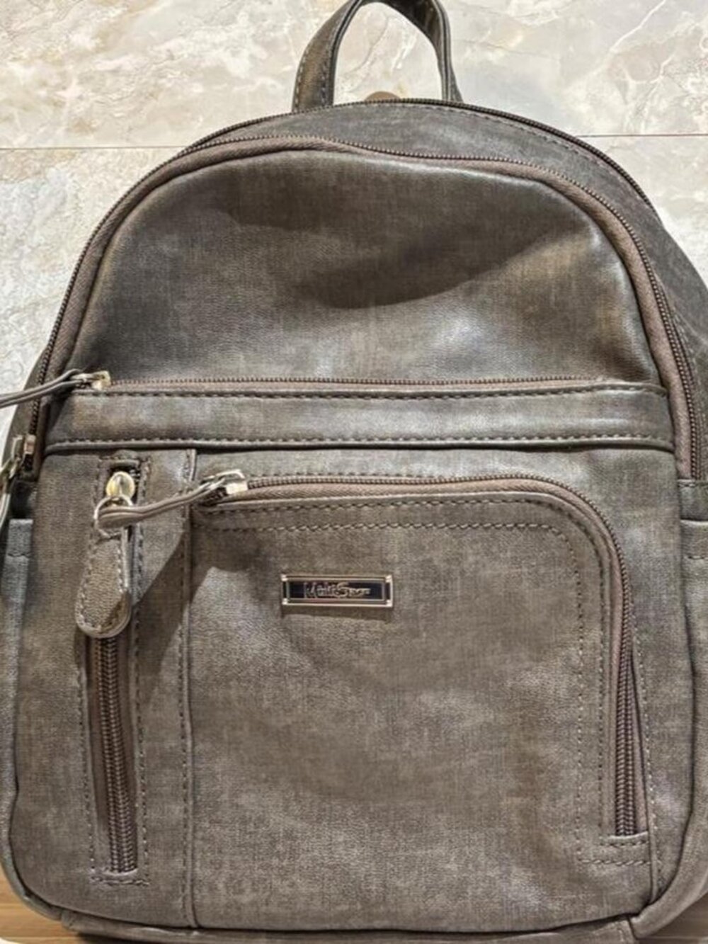 MultiSac Multi-Pocket Mini Backpack